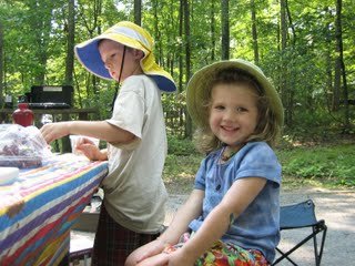 Camping kid giving pose and other is standing